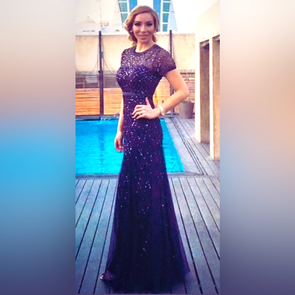 Long gala dress features a slim-flare silhouette in linear beaded mesh. Size2